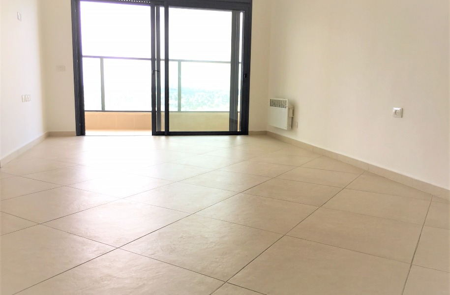 Living room and window door to balcony